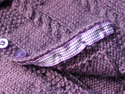 Cable and Seed Stitch Jacket, closeup of button band reinforcement