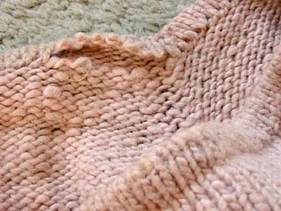 The Hourglass Sweater, unraveling in anticipation